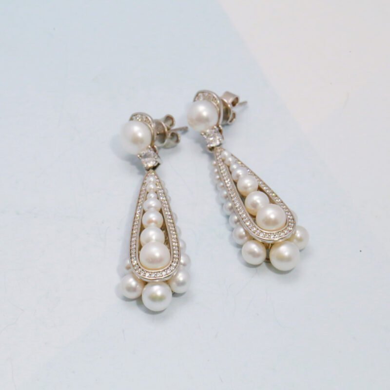Sleek Pod-Shaped Natural Pearl Earrings